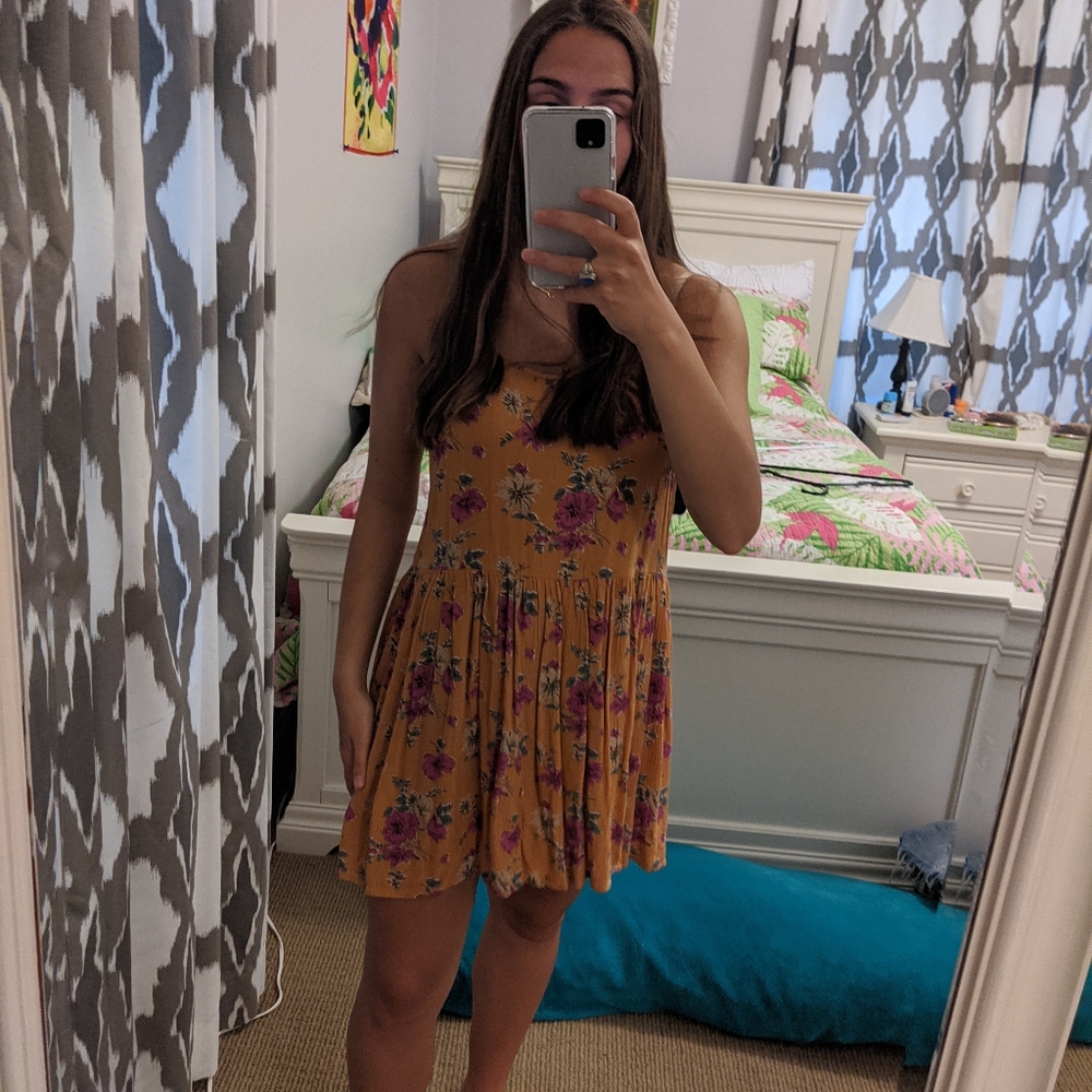 Flowy baby doll yellow dress.